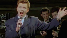 <p>Rick Astley is a 1980s British dance music performer, baritone. His most famous song - "Never Gonna Give You Up" - stayed at the top of the UK charts for 5 weeks, and in 2007 spawned the Internet meme "Rickrolled"</p>